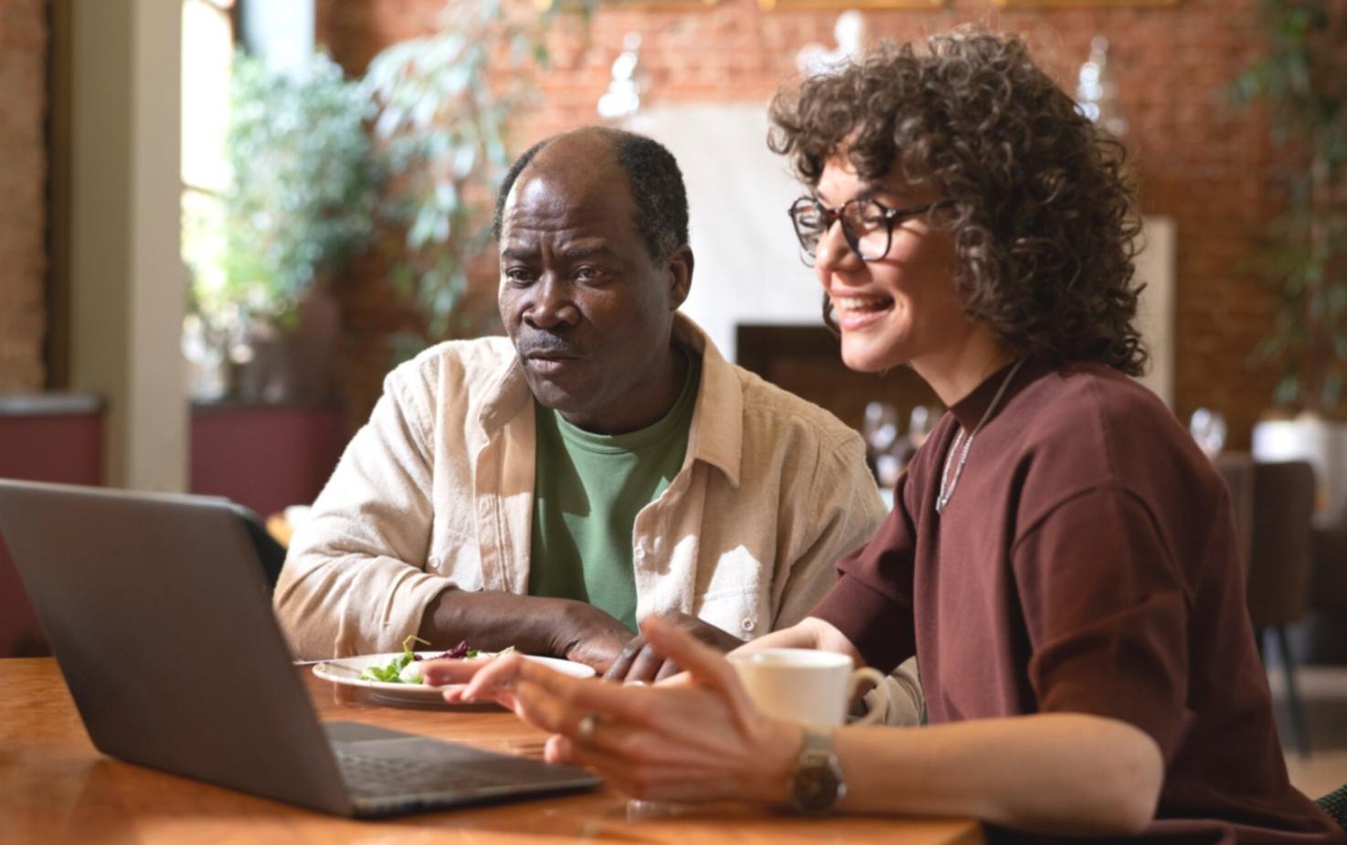 Trading analysis workspace with multiple monitors showing market data and charts