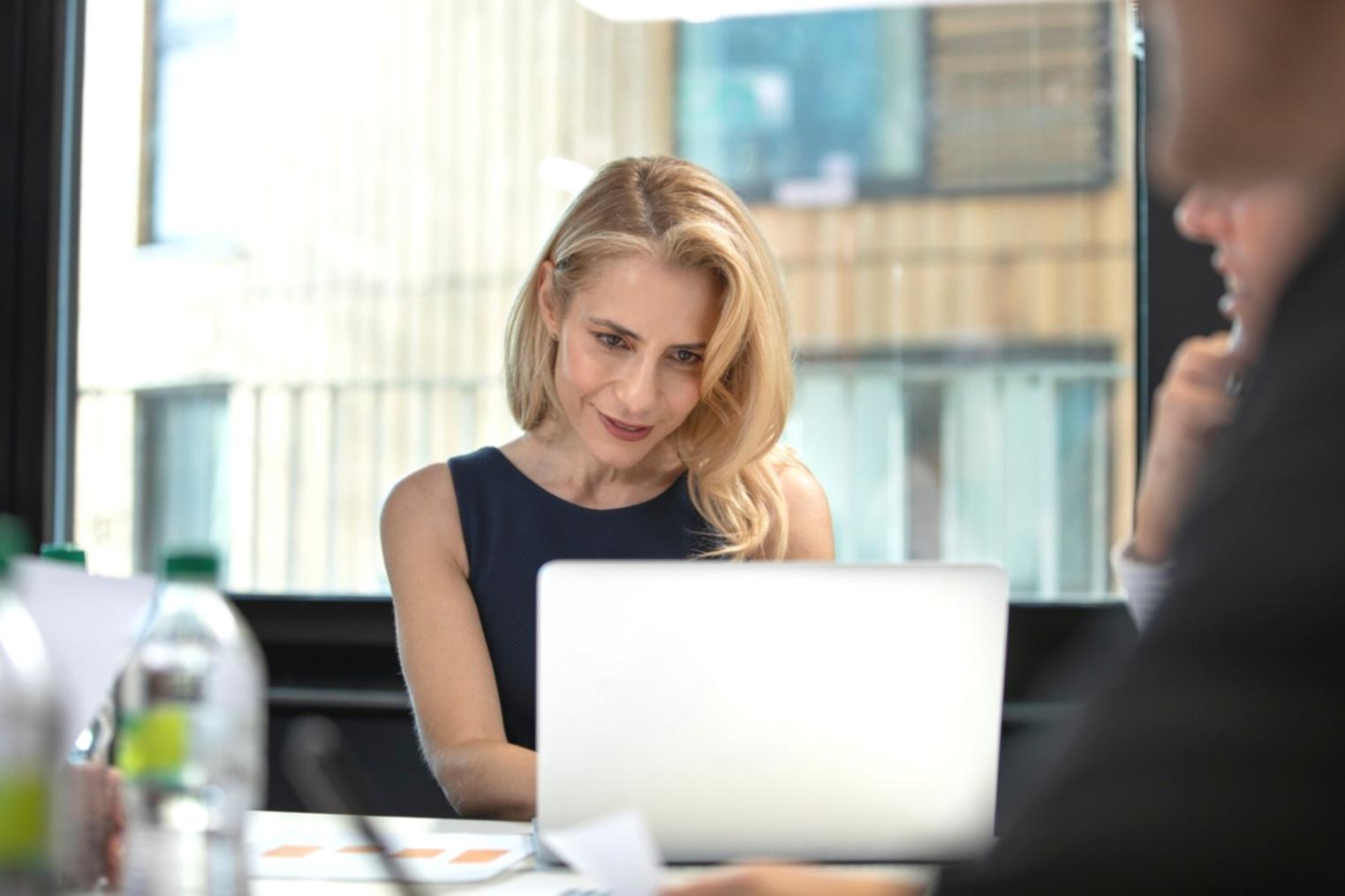 Advanced trading strategy analysis workspace showing multiple monitors with market data and analytical frameworks